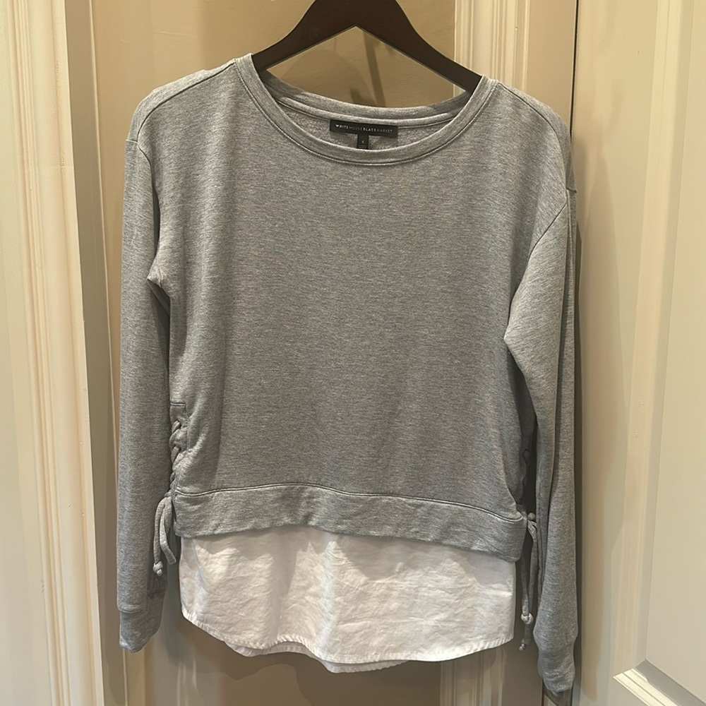 White House Black Market cozy cotton shirt with white undershirt detailing.